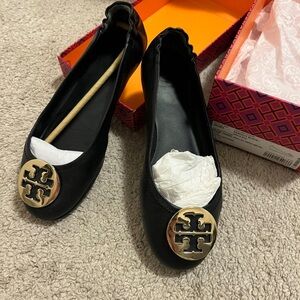 Tory Burch Black Flats with Gold Emblem